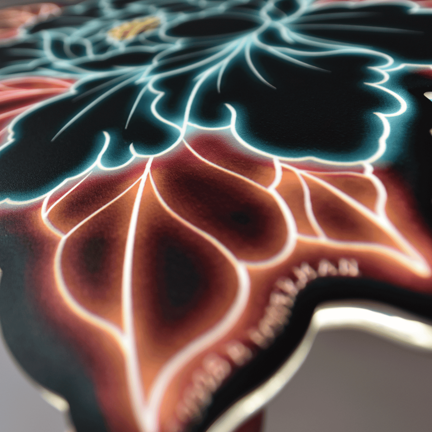 Close up at angle of original Peony tattoo design by Bryce Bowerman printed on acrylic with UV printer with added LED light on in lighted room