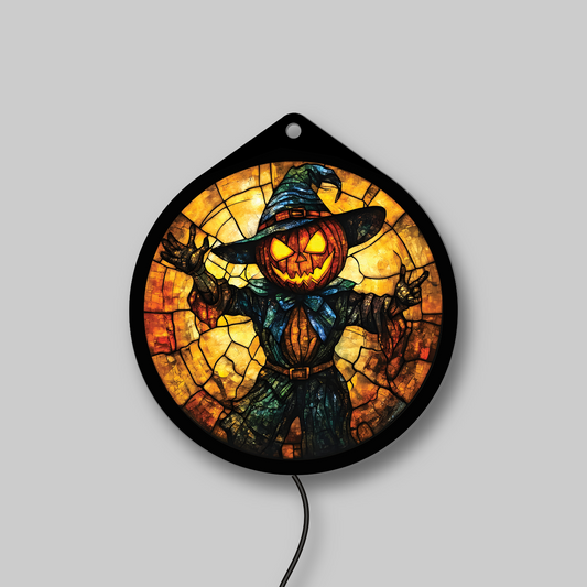 Skull scarecrow faux stained glass LED sign in a witch hat with bow tie, lights off