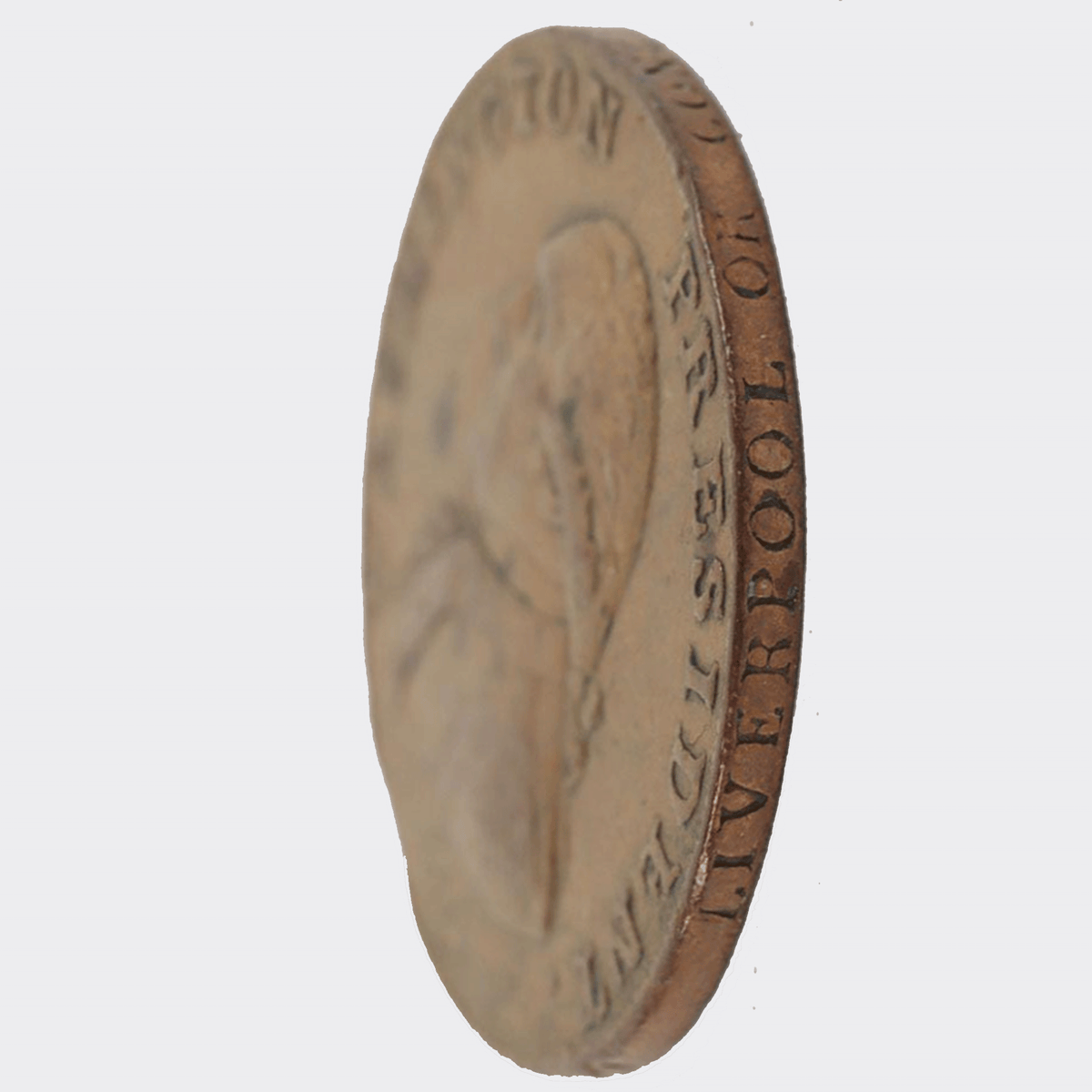 Close-up of a 1791 George Washington One Cent coin at an angle