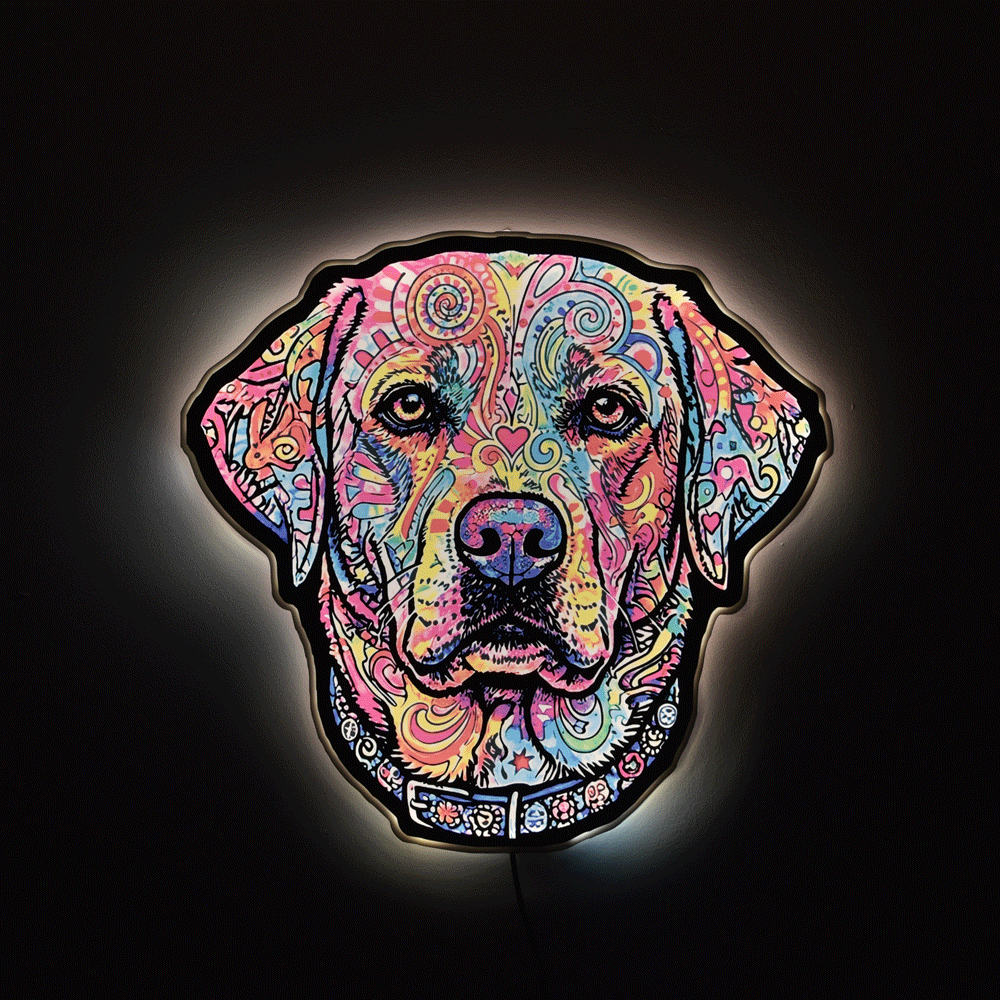 A c lorful LED neon-style wall light shaped like a Labrador Retriever's head, featuring a vibrant psychedelic pattern of pink, blue, yellow, and orange on a black background.
