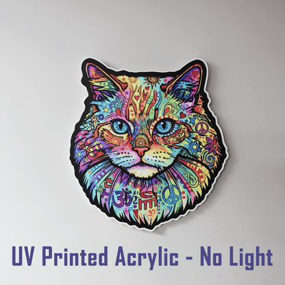 A colorful, psychedelic cat face acrylic sticker with intricate mandala and peace sign patterns, shown against a plain light gray background with the text 'UV Printed Acrylic - No Light' at the bottom.