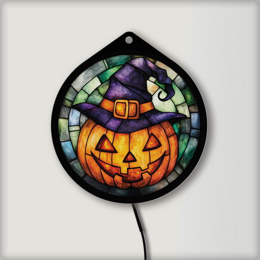 Jack-o'-lantern in a witch hat faux stained glass LED sign, lights off