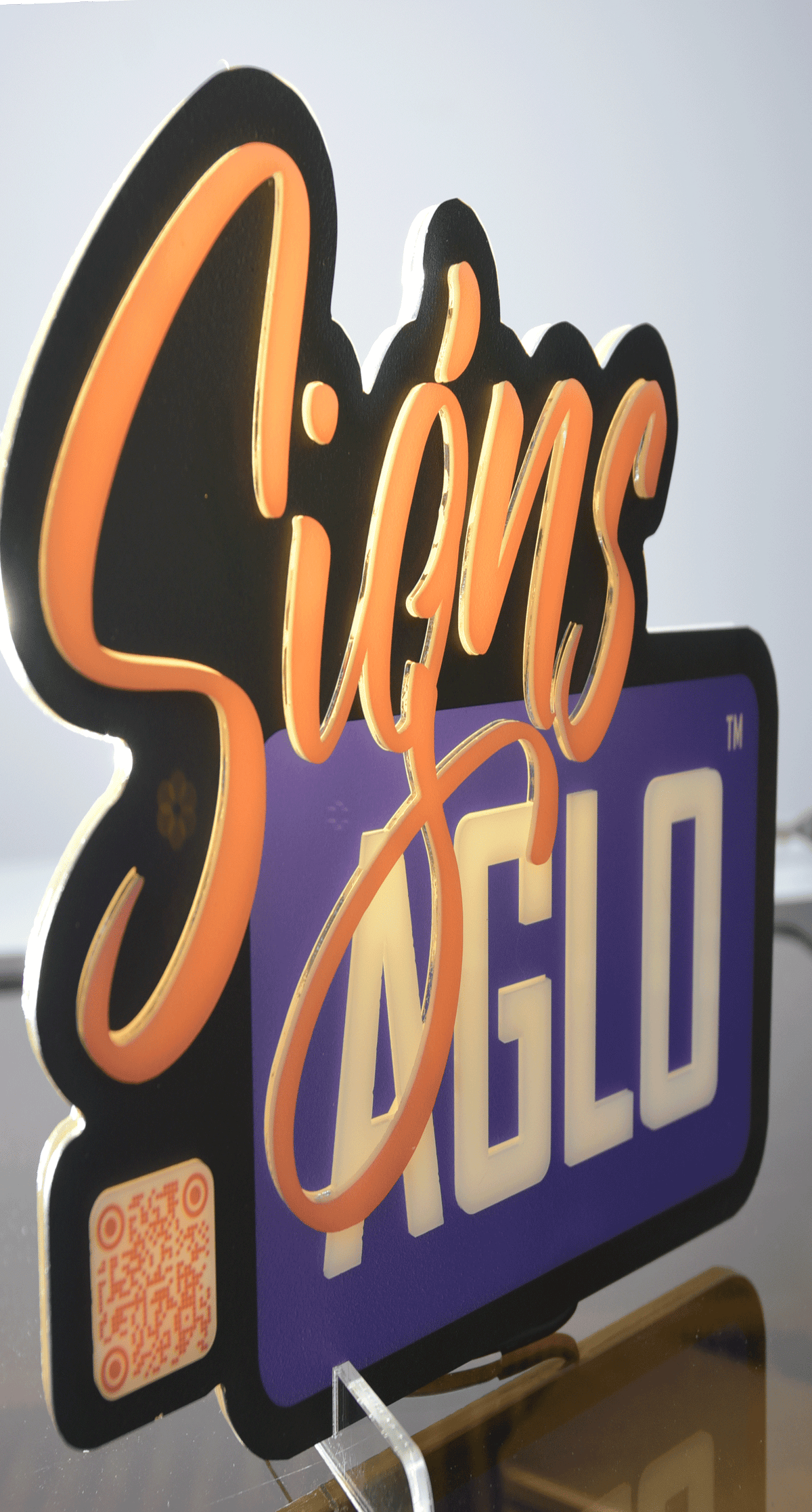 Signs AGLO log on a standup sign with internal light source