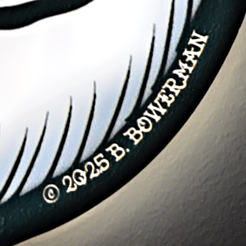 Close-up of the Tiger Tattoo Tacker focusing on  copyright 2025 B. Bowerman