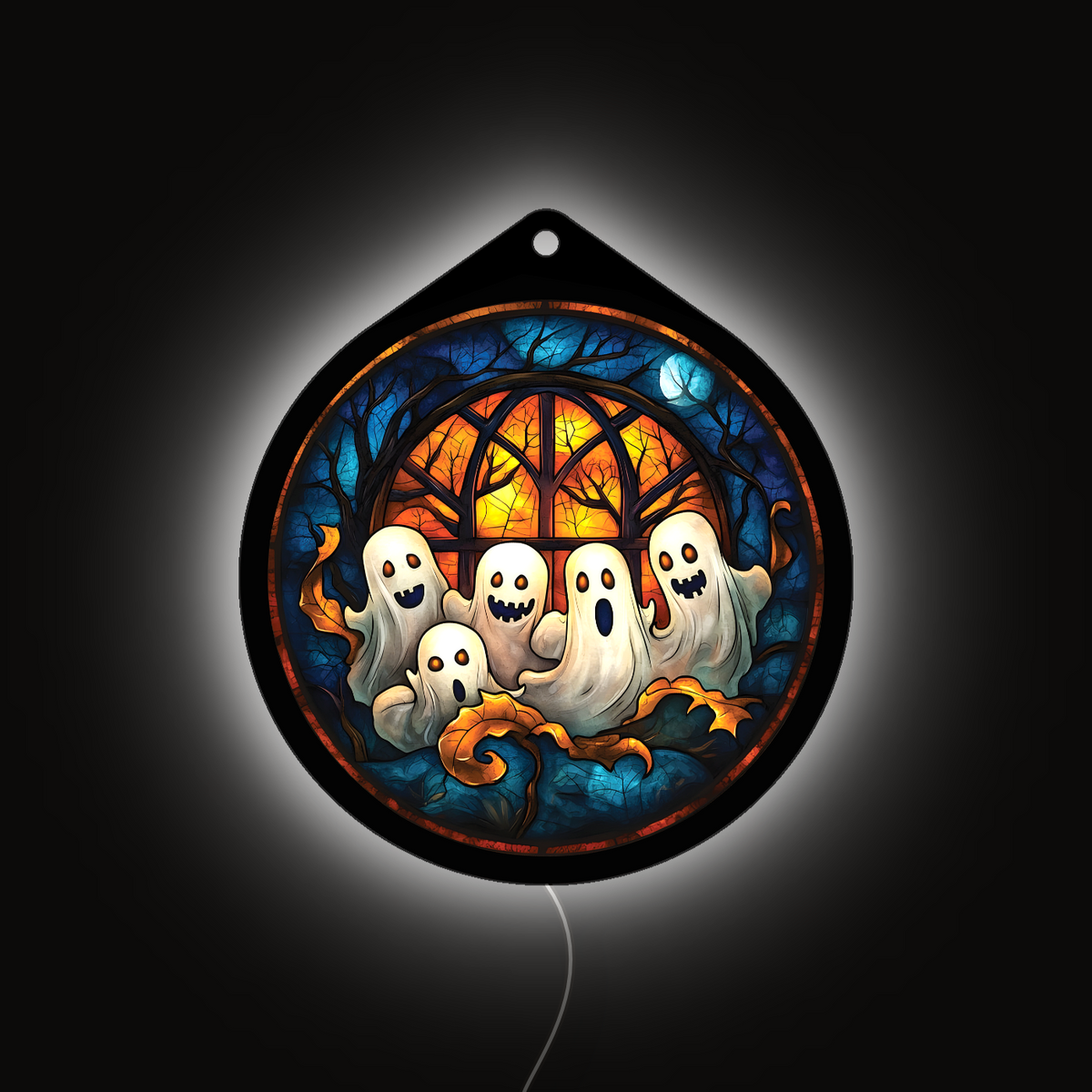 Ghost family LED sign glowing brightly against a dark background