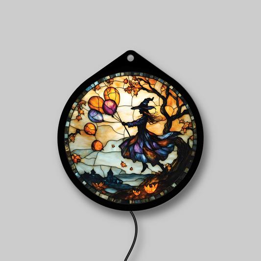 Flying witch with balloons faux stained glass LED sign, lights off