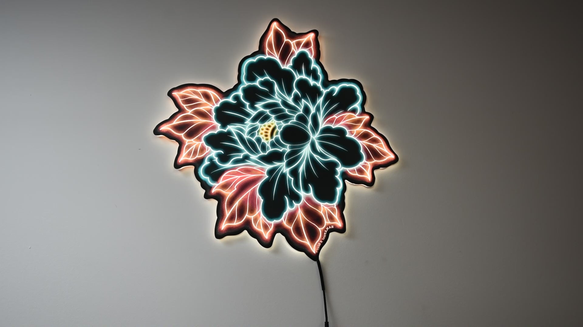 LED light on and off with room light on and off to show illumination of Original Peony tattoo design by Bryce Bowerman printed on acrylic with UV printer with added LED light.